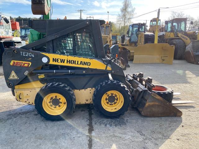 N1 Chargeuse compacte New Holland L160 – 2006 – Image 1