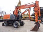 Pelle sur pneus Hitachi ZX140W 2008 – 14,7T – 5410h – Occasion